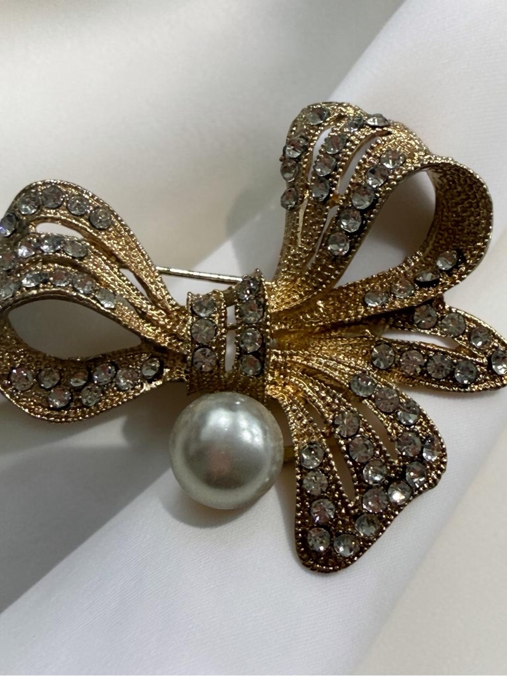 Gold Crystal Bow Brooch with Pearl Accent